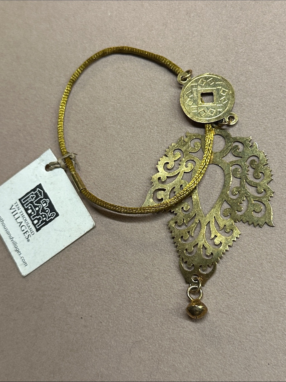 NEW - Ten Thousand Villages gold tone bracelet with pendant, leaf shape NWT